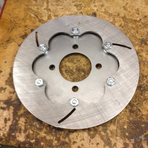 Disc brake spacer/adaptor
