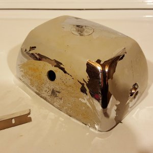 Rupp headlight bucket stripped with razor blade