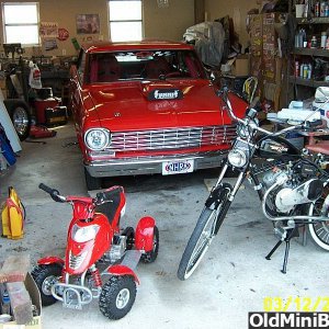 Messy shop.You can see my Whizzer and pit scoot.